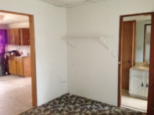 I obviously did a nice job documenting the laundry room! Here you see the kitchen on the left and into the bath on the right.