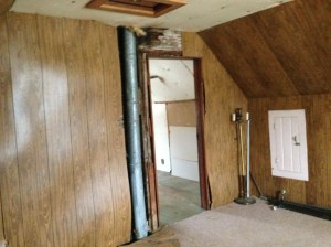 The furnace vent has a huge bulkhead in the kitchen downstairs, but is exposed upstairs.