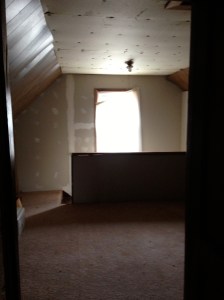 There are two huge windows on either end of the gables. Here you see the half-wall at the top of the stairs.