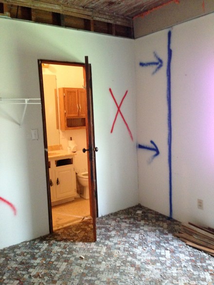 On the other side of the bathroom, the wall will move about 2 feet into the laundry room, making the bathroom a little less than 6 feet wide (rather than its current less than 4-foot width). 