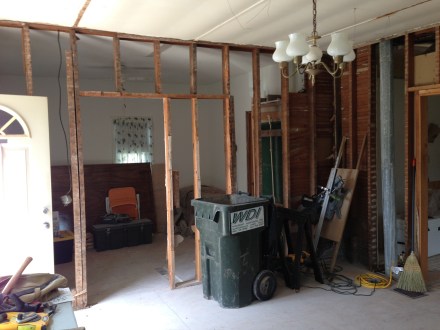 Here's the wall now. No lath, and no mess! The framing (some with bark still on it) comes down soon!